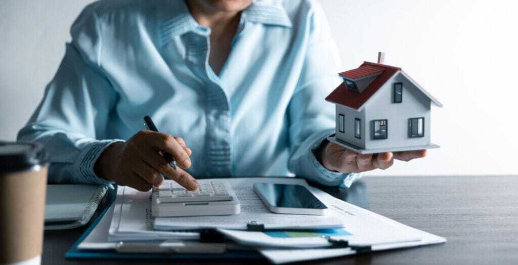 Australian mortgage broker collaborating with an offshore assistant to streamline loan processing and compliance.